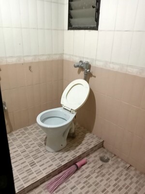 Bathroom in 2 BHK Apartment at Raichandani Megha Terrace CHS, Aundh – for Rent