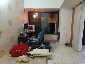 Living Room in Studio Apartment at Garden View Apartment, Goregaon East – for Sale