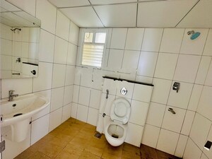 Bathroom in 3 BHK Apartment at Godrej Aqua, International Airport Road – for Rent