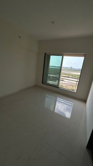 Room in 2 BHK Apartment at Lotus Sky Garden, Malad West – for Sale