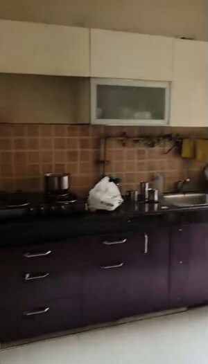 Kitchen in 2 BHK Apartment at Mahagun Mywoods, Sector 16c Greater Noida – for Rent