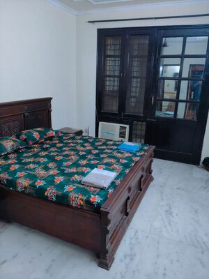 Bedroom in 3 BHK Builder Floor at Ansal Sushant Lok I, Sector 43 – for Rent