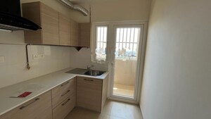 Kitchen in 2 BHK Apartment at Bhartiya City Nikoo Homes 4, Thanisandra Main Road – for Rent