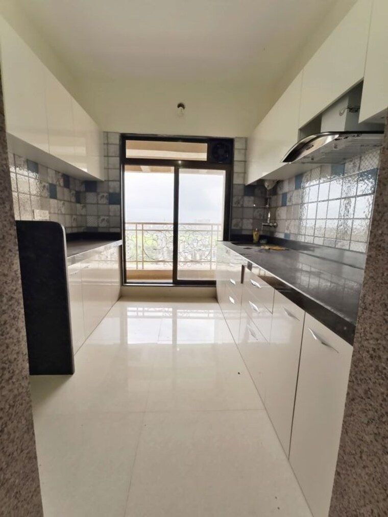 Kitchen, paradise-sai-symphony  1350 Sq.Ft. Apartment In Kharghar Navi Mumbai 10611326