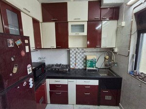 Kitchen in 1 BHK Apartment at Osho Krishna, Thane West – for Rent