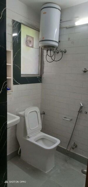 Bathroom in 3 BHK Apartment at Vasant Vihar – for Rent