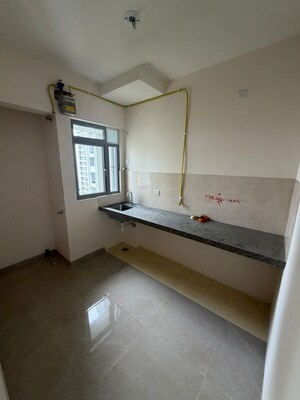 Kitchen in 1 BHK Apartment at Piramal Vaikunth Cluster 2, Balkum Pada – for Rent