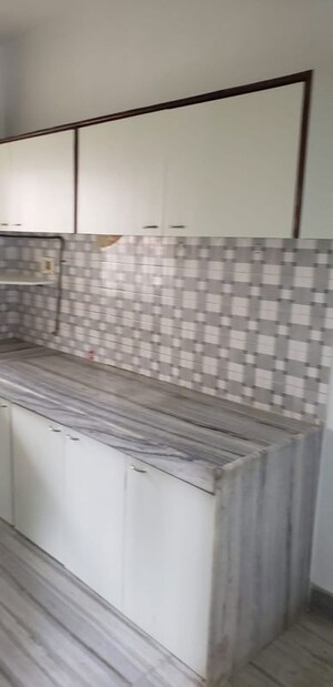 Kitchen in 2 BHK Apartment at Noopur CHS, Vile Parle West – for Rent