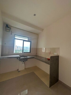 Kitchen in 1 BHK Apartment at Piramal Vaikunth Cluster 2, Balkum Pada – for Rent