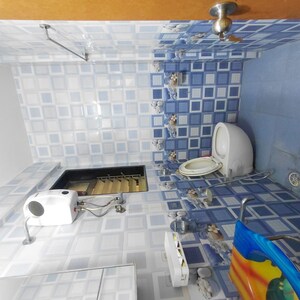 Bathroom in 2 BHK Apartment at Sadguru Complex I, Goregaon East – for Sale