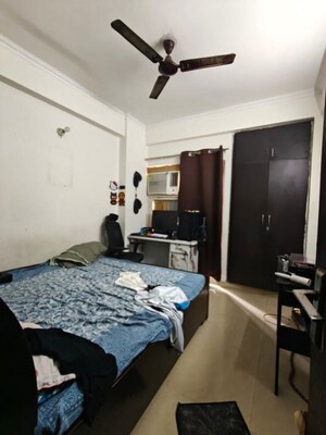 Bedroom in 2 BHK Apartment at Aims Golf City, Sector 75 – for Sale