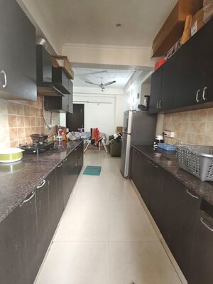 Kitchen in 2 BHK Apartment at Aims Golf City, Sector 75 – for Sale