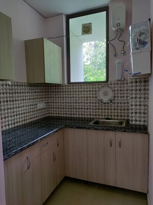 Kitchen in 1 BHK Builder Floor at Sushant Lok I – for Rent