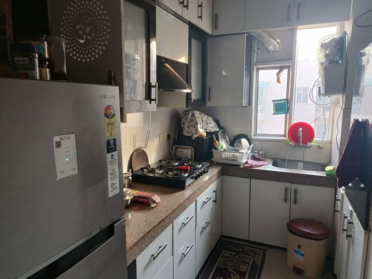 Kitchen, amrapali-ivory-heights 2 Bedroom 950 Sq.Ft. Apartment In Amrapali Dream Valley Greater Noida 10611538