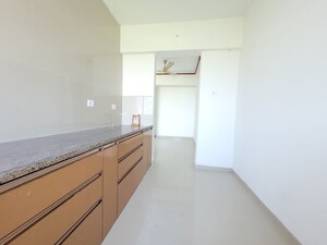 Kitchen in 2 BHK Apartment at Puranik City Reserva, Ghodbunder Road – for Rent