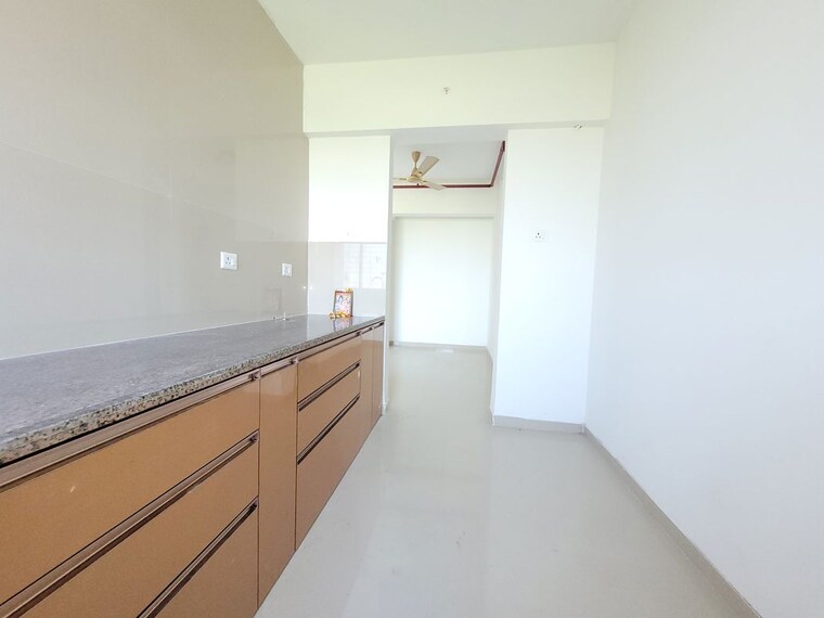 Kitchen, puranik-city-reserva 2 Bedroom 650 Sq.Ft. Apartment In Ghodbunder Road Thane 10611440