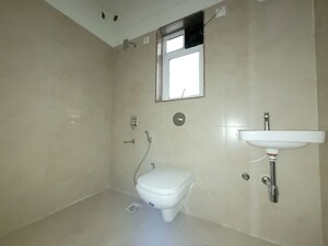Bathroom in 2 BHK Apartment at Puranik City Reserva, Ghodbunder Road – for Rent