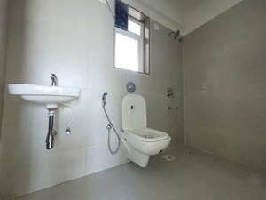 Bathroom in 2 BHK Apartment at Puranik City Reserva, Ghodbunder Road – for Rent