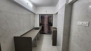 Kitchen in 2 BHK Apartment at Suvrat CHS, Tembhi Naka – for Sale