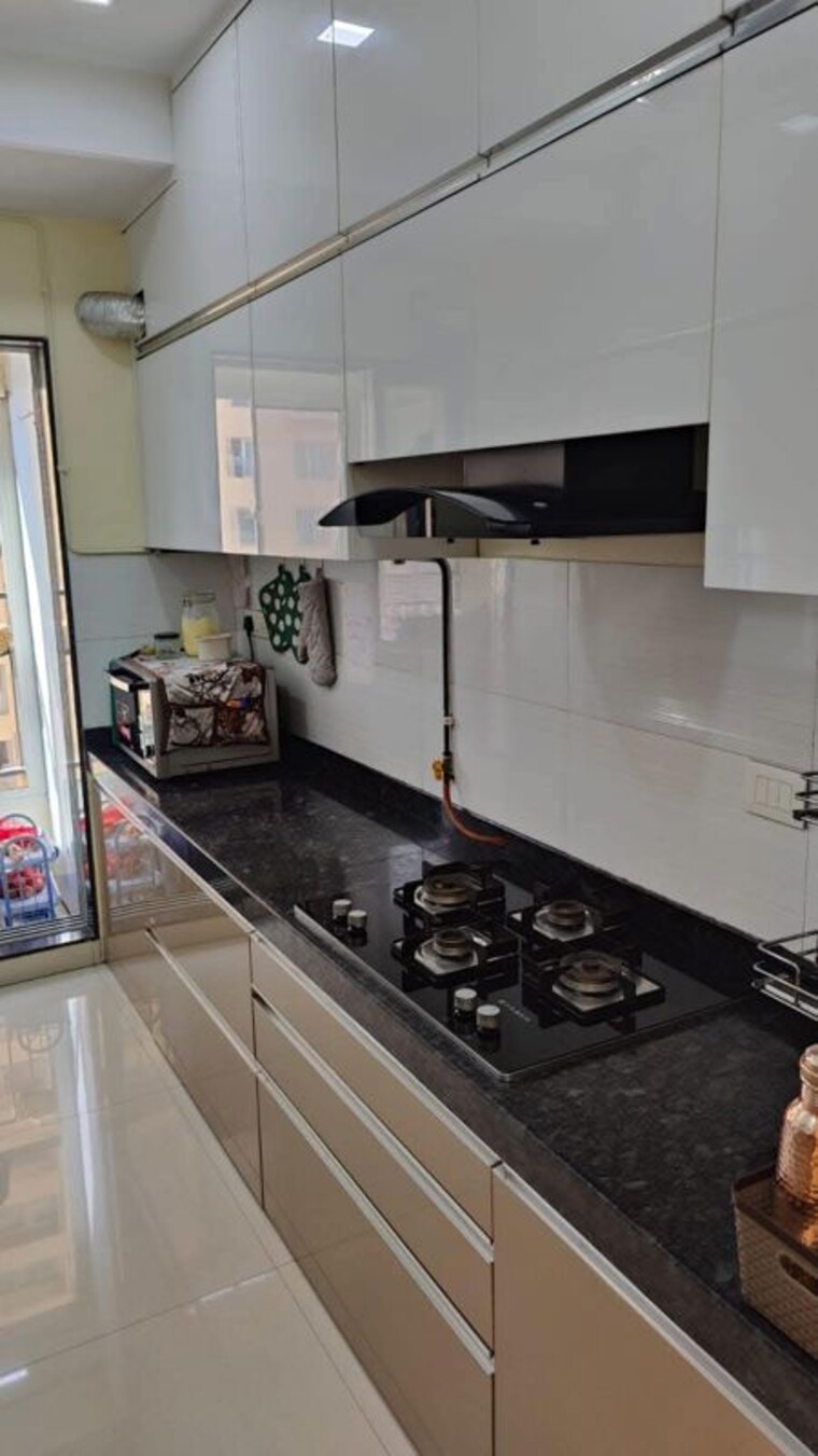 Kitchen, rustomjee-azziano-wing-k 2 Bedroom 900 Sq.Ft. Apartment In Thane West Thane 10611619