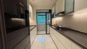 Kitchen in 3 BHK Apartment at Hiranandani Estate Aralia, Ghodbunder Road – for Sale