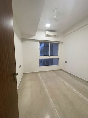 Room in 2 BHK Apartment at Omkar Alta Monte, Malad East – for Rent