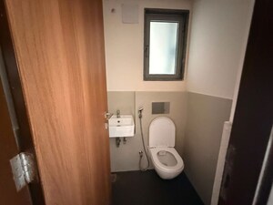 Bathroom in 1 BHK Apartment at Piramal Vaikunth, Balkum Pada – for Rent