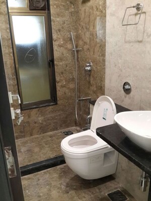 Bathroom in 2 BHK Apartment at KL Vienna, Khar West – for Rent