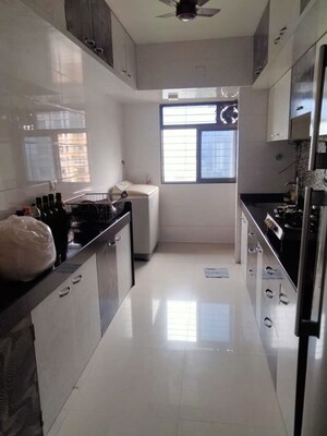 Kitchen in 2 BHK Apartment at Highland Tower, Lokhandwala – for Rent