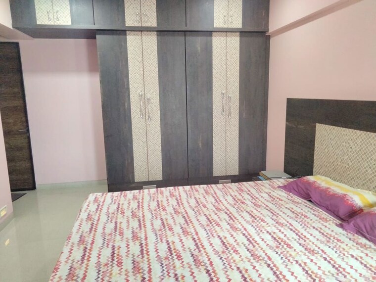 Bedroom, highland-tower 2 Bedroom 700 Sq.Ft. Apartment In Lokhandwala Mumbai 10611798