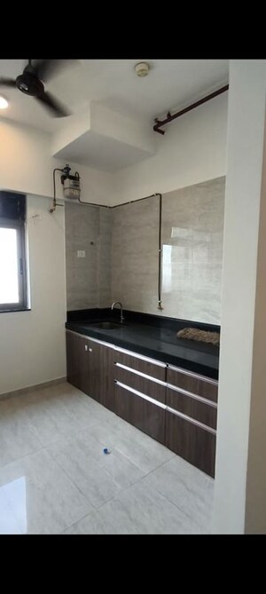 Kitchen in 2 BHK Apartment at Sheth Auris Serenity Tower 2, Malad West – for Rent