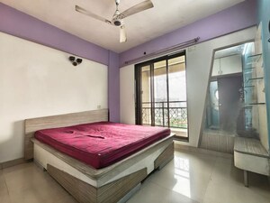 Bedroom in 2 BHK Apartment at NRI Complex Phase 2, Seawoods – for Rent