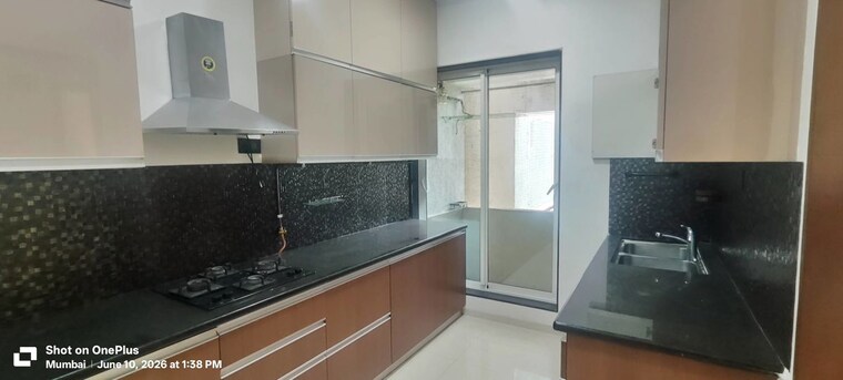 Kitchen, ajmera-i-land-zeon 2 Bedroom 925 Sq.Ft. Apartment In Bhakti Park Mumbai 10438249