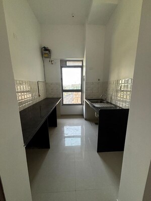 Team Area in 1 BHK Apartment at Lodha Amara, Kolshet Road – for Rent