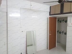 Building Lobby in 1 BHK Apartment at Runwal Plaza, Vartak Nagar – for Rent