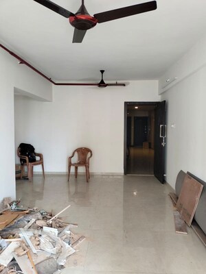 Living Room in 2 BHK Apartment at Shree Tirupati STG Signature Residency, Patlipada – for Rent