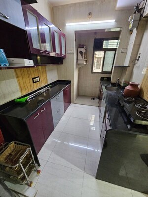 Kitchen in 1 BHK Apartment at Swastik Palms CHS, Brahmand – for Rent