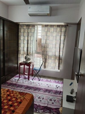 Living Room in 2 BHK Apartment at Lodha Amara, Kolshet Road – for Rent