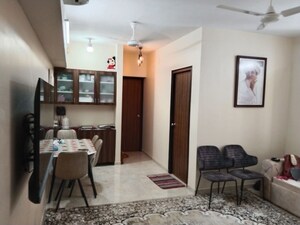 Living Room in 2 BHK Apartment at Lodha Amara, Kolshet Road – for Rent