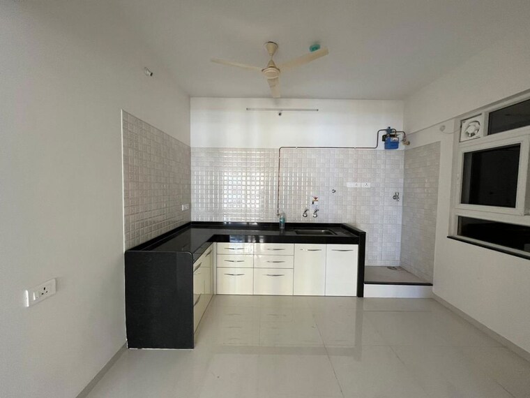 Kitchen, nyati-elysia 2 Bedroom 750 Sq.Ft. Apartment In Kharadi Pune 10611968