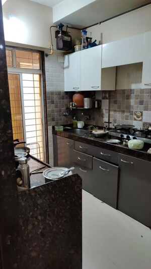 Kitchen in 2 BHK Apartment at Paras Nagar CHS Kandivali, Kandivali West – for Rent