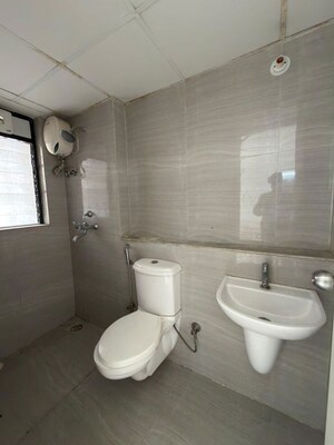 Bathroom in 1 BHK Apartment at Runwal Gardens, Dombivli East – for Rent