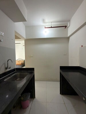 Kitchen in 1 BHK Apartment at Runwal Gardens, Dombivli East – for Rent