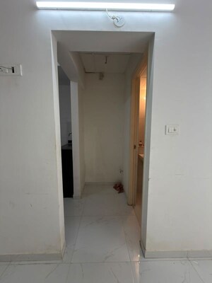 Building Lobby in 1 BHK Apartment at Runwal Gardens, Dombivli East – for Rent