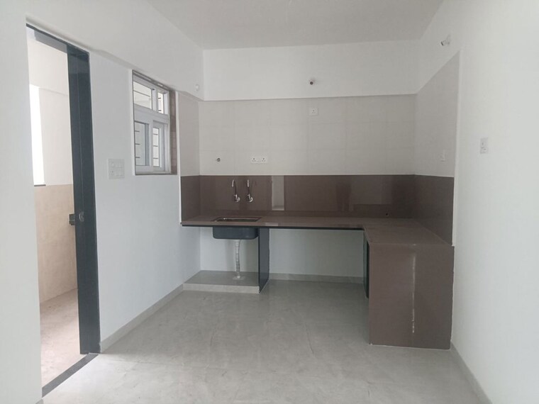 Kitchen, rr-lunkad-66-avenue 2 Bedroom 650 Sq.Ft. Apartment In Pimple Nilakh Pune 10612035