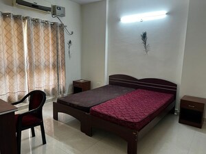 Bedroom in 3.5 BHK Builder Floor at Rohtas Presidential Tower, Vibhuti Khand – for Rent