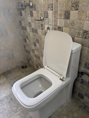 Bathroom in 3 BHK Apartment at Nilaya Greens, Raj Nagar Extension – for Rent