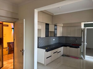Kitchen in 3 BHK Apartment at Nilaya Greens, Raj Nagar Extension – for Rent