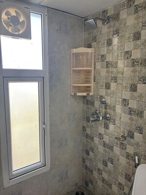 Bathroom in 3 BHK Apartment at Nilaya Greens, Raj Nagar Extension – for Rent