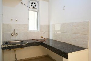 Kitchen in 2 BHK Apartment at Ajnara Homes, Sector 16b Greater Noida – for Sale